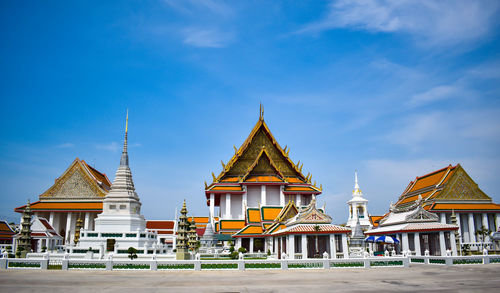 View of temple building against blue sky