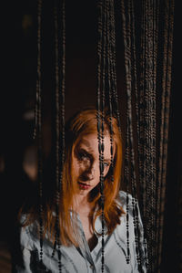 Portrait of beautiful young woman with decoration