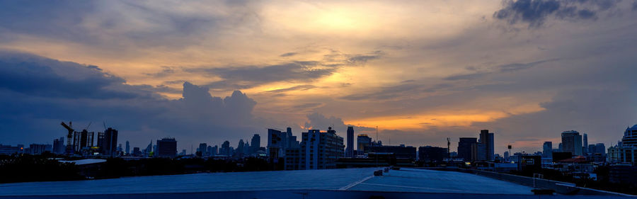 City lit up at sunset