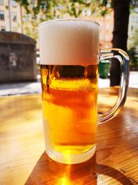 Close-up of beer glass on table