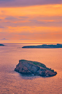 Aegean sea with islands view on sunset