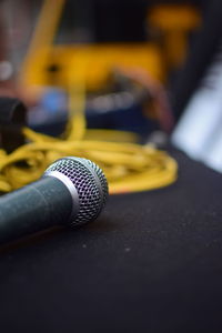 Close-up of yellow guitar