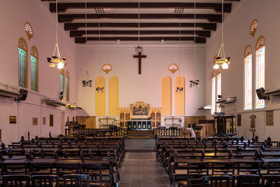 View of empty chairs and tables in building