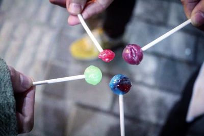 Close-up of hand holding ice cream