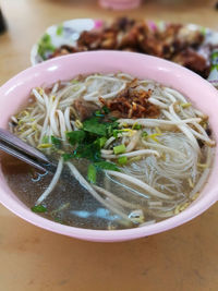 Close-up of soup served on table