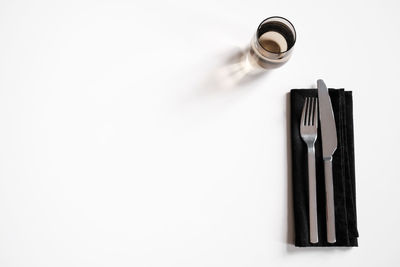 High angle view of coffee on table against white background