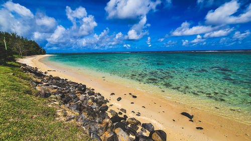 Scenic view of beach against sky