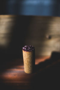 Close-up of candle on table