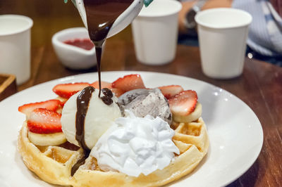 Close-up of breakfast served on table