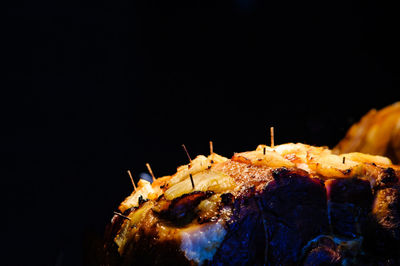 Close-up of ice cream against black background