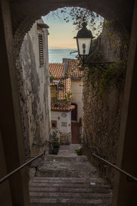 Narrow alley amidst buildings in town