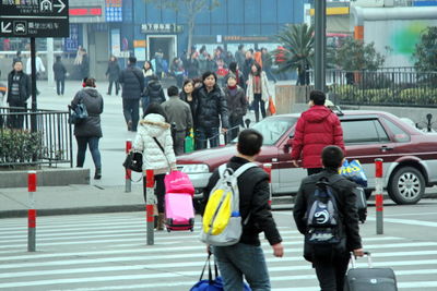 Man standing on city street