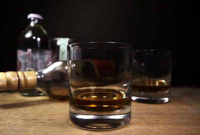Close-up of beer glass on table