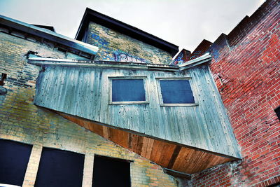 Low angle view of old building against sky