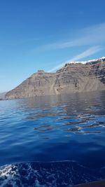 Scenic view of sea against blue sky