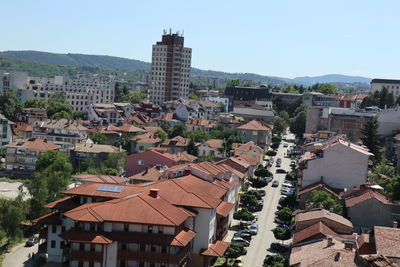High angle view of buildings in city against sky