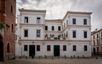 Low angle view of old building against sky