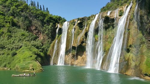 Scene is waterfall, jiulong or nine dragon water falls.