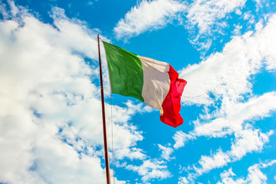 Low angle view of flag against sky