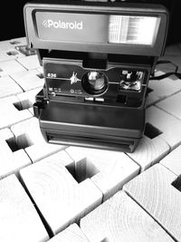 Close-up of clock on table