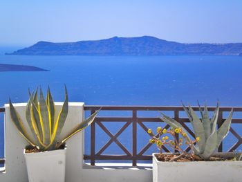 Scenic view of calm sea against blue sky