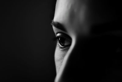 Close-up portrait of a serious young woman