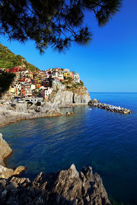 Residential district on rocky mountain by sea