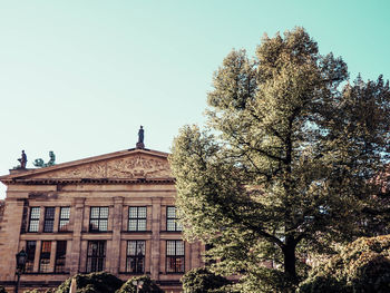 Low angle view of old building against clear sky