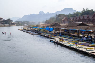 Panoramic view of sea and mountains against sky