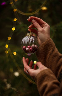 Midsection of woman holding ice cream