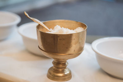 Close-up of coffee cup on table