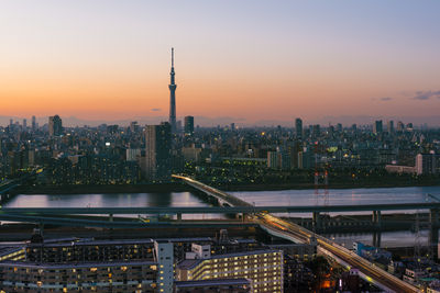 Tokyo skytree and asakusa district skyline during sunset. 