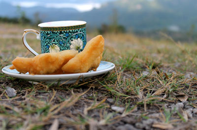 Close-up of coffee cup on table
