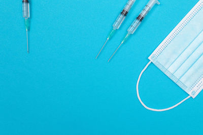 High angle view of pencils over swimming pool