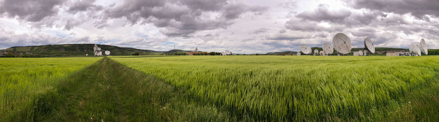 Panoramic view of landscape and houses against sky