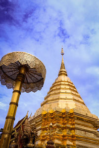 Low angle view of temple against building