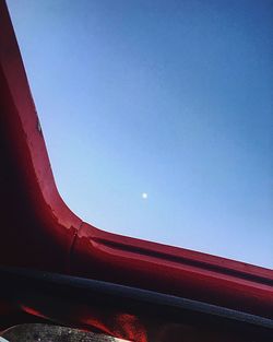 Low angle view of built structure against clear blue sky