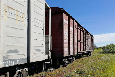 Train on railroad track against sky