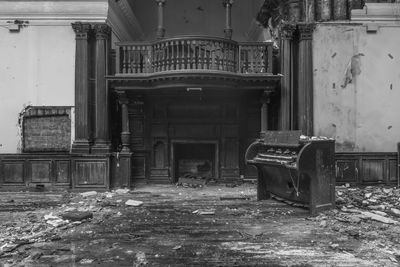 Piano and gallery in abandoned ballroom