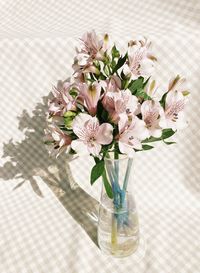 Close-up of flower vase on table