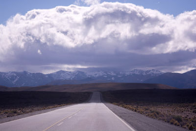 Empty road against sky