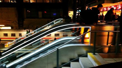 Illuminated train at night