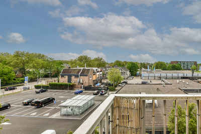 High angle view of cars on road against sky