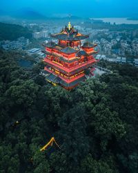 High angle view of illuminated temple building against sky