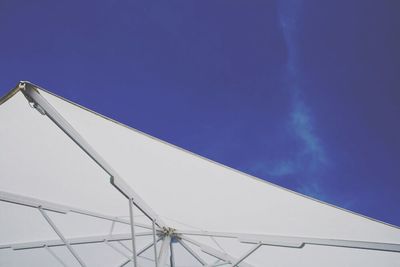 Low angle view of built structure against blue sky