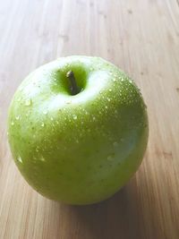 High angle view of apple on table