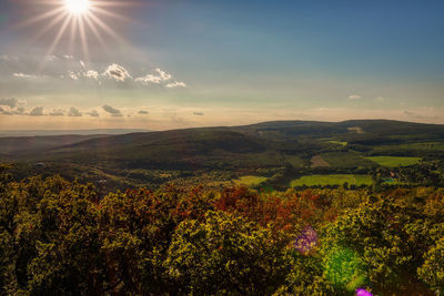 Scenic view of landscape against sky during sunset