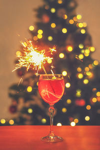 Close-up of sparkler on table