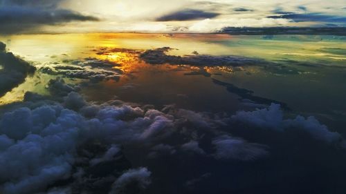 Scenic view of sea against cloudy sky