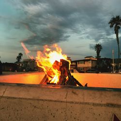 Bonfire against sky